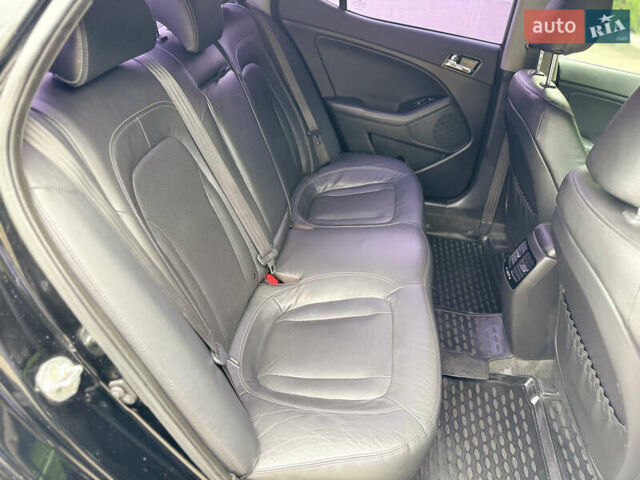 Черный Киа Оптима, объемом двигателя 2 л и пробегом 177 тыс. км за 9700 $, фото 27 на Automoto.ua