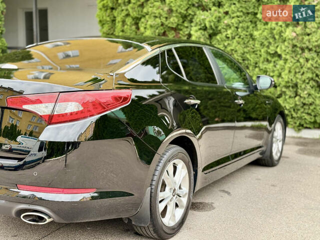 Черный Киа Оптима, объемом двигателя 2 л и пробегом 177 тыс. км за 9700 $, фото 7 на Automoto.ua