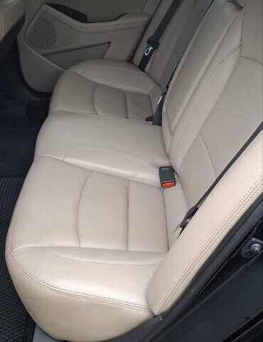 Черный Киа Оптима, объемом двигателя 2.36 л и пробегом 225 тыс. км за 8800 $, фото 4 на Automoto.ua