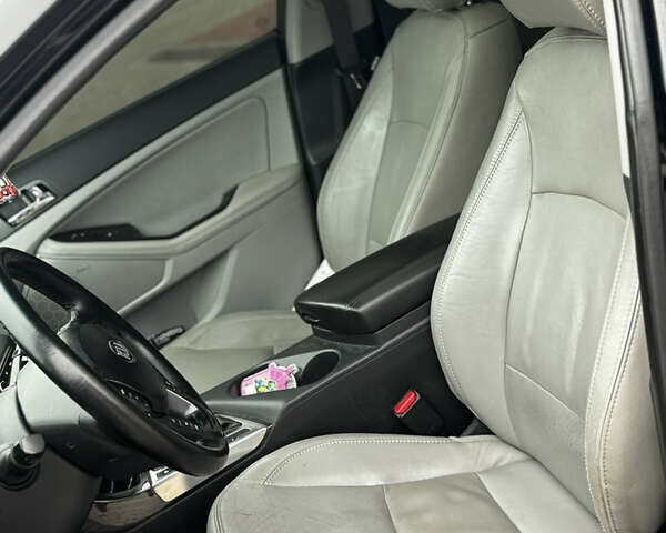 Чорний Кіа Оптіма, об'ємом двигуна 2.36 л та пробігом 206 тис. км за 6850 $, фото 26 на Automoto.ua