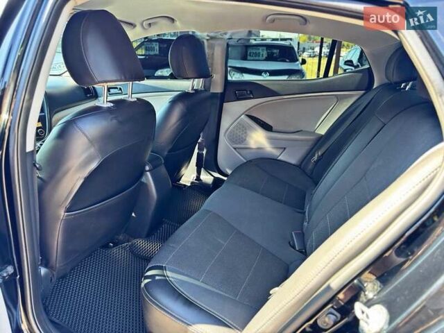 Черный Киа Оптима, объемом двигателя 0 л и пробегом 180 тыс. км за 9350 $, фото 4 на Automoto.ua