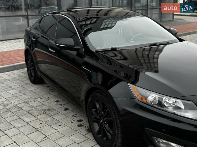 Чорний Кіа Оптіма, об'ємом двигуна 2.36 л та пробігом 206 тис. км за 6850 $, фото 9 на Automoto.ua
