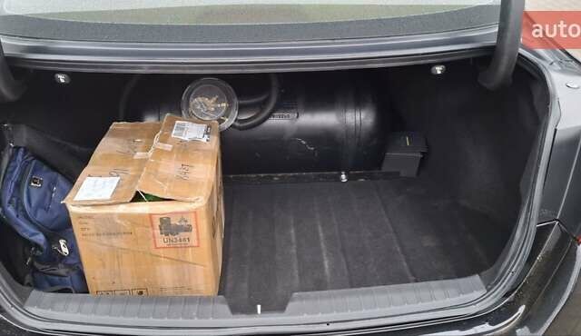 Черный Киа Оптима, объемом двигателя 2.36 л и пробегом 225 тыс. км за 8800 $, фото 7 на Automoto.ua