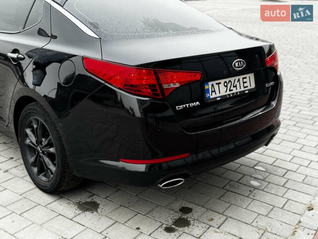 Чорний Кіа Оптіма, об'ємом двигуна 2.36 л та пробігом 206 тис. км за 6850 $, фото 21 на Automoto.ua