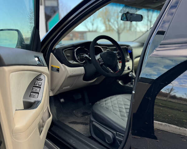 Черный Киа Оптима, объемом двигателя 2.36 л и пробегом 210 тыс. км за 10500 $, фото 7 на Automoto.ua