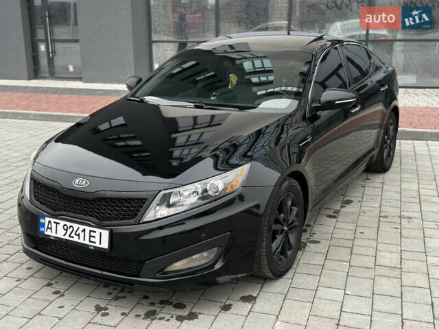 Чорний Кіа Оптіма, об'ємом двигуна 2.36 л та пробігом 206 тис. км за 6850 $, фото 18 на Automoto.ua