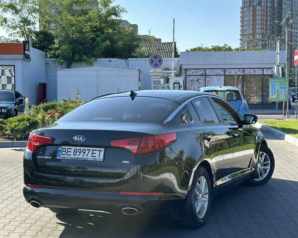 Черный Киа Оптима, объемом двигателя 2.4 л и пробегом 310 тыс. км за 8000 $, фото 3 на Automoto.ua