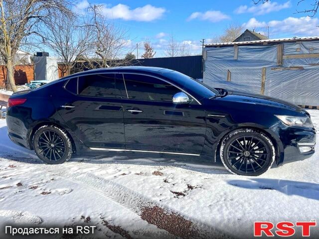 Черный Киа Оптима, объемом двигателя 2 л и пробегом 145 тыс. км за 10000 $, фото 2 на Automoto.ua