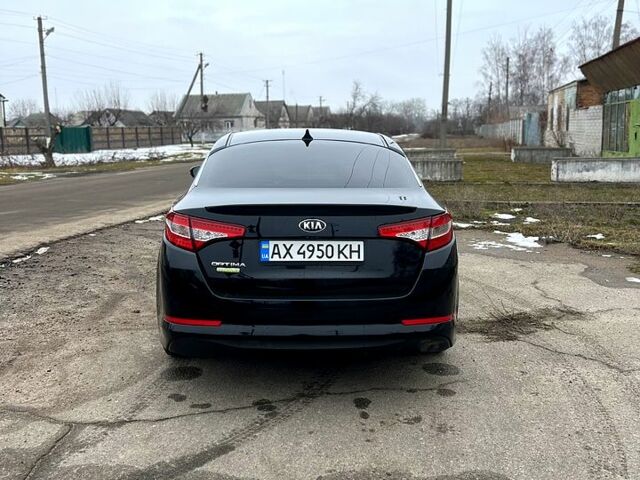 Чорний Кіа Оптіма, об'ємом двигуна 2.4 л та пробігом 175 тис. км за 9150 $, фото 3 на Automoto.ua