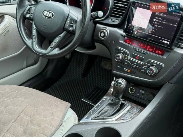 Черный Киа Оптима, объемом двигателя 2.36 л и пробегом 271 тыс. км за 8400 $, фото 18 на Automoto.ua