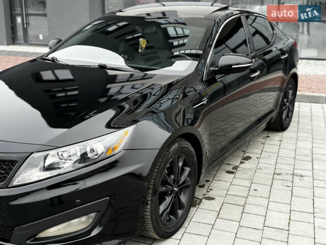Чорний Кіа Оптіма, об'ємом двигуна 2.36 л та пробігом 206 тис. км за 6850 $, фото 10 на Automoto.ua
