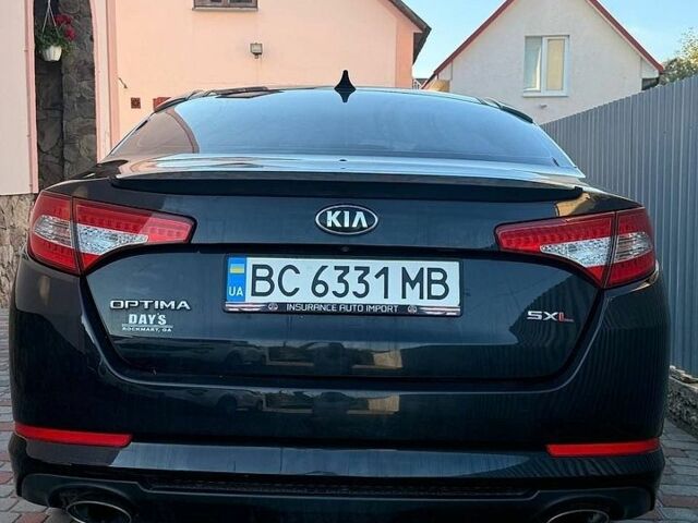 Чорний Кіа Оптіма, об'ємом двигуна 2 л та пробігом 123 тис. км за 9500 $, фото 5 на Automoto.ua