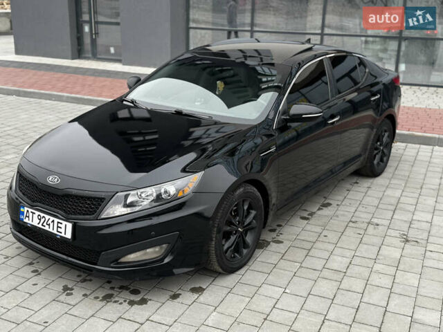 Чорний Кіа Оптіма, об'ємом двигуна 2.36 л та пробігом 206 тис. км за 6850 $, фото 20 на Automoto.ua