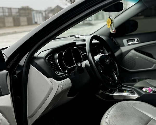 Чорний Кіа Оптіма, об'ємом двигуна 2.36 л та пробігом 206 тис. км за 6850 $, фото 28 на Automoto.ua