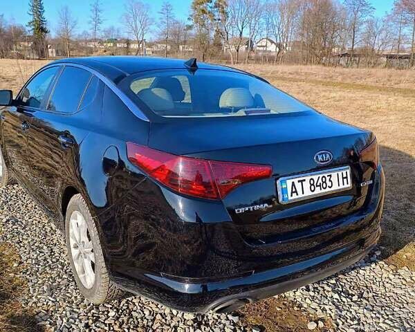 Черный Киа Оптима, объемом двигателя 2.4 л и пробегом 165 тыс. км за 7300 $, фото 2 на Automoto.ua