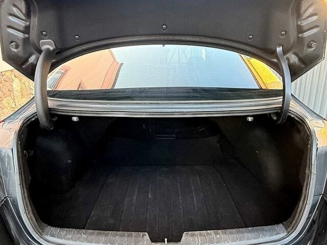 Чорний Кіа Оптіма, об'ємом двигуна 2 л та пробігом 123 тис. км за 9500 $, фото 7 на Automoto.ua