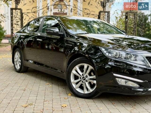 Черный Киа Оптима, объемом двигателя 2 л и пробегом 183 тыс. км за 9800 $, фото 13 на Automoto.ua