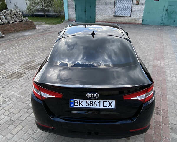 Черный Киа Оптима, объемом двигателя 2.4 л и пробегом 250 тыс. км за 8500 $, фото 5 на Automoto.ua