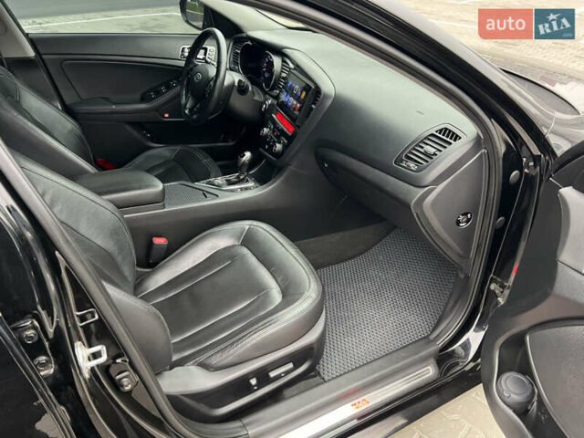 Черный Киа Оптима, объемом двигателя 2 л и пробегом 185 тыс. км за 10200 $, фото 6 на Automoto.ua