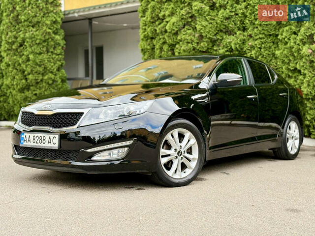 Черный Киа Оптима, объемом двигателя 2 л и пробегом 177 тыс. км за 9700 $, фото 14 на Automoto.ua