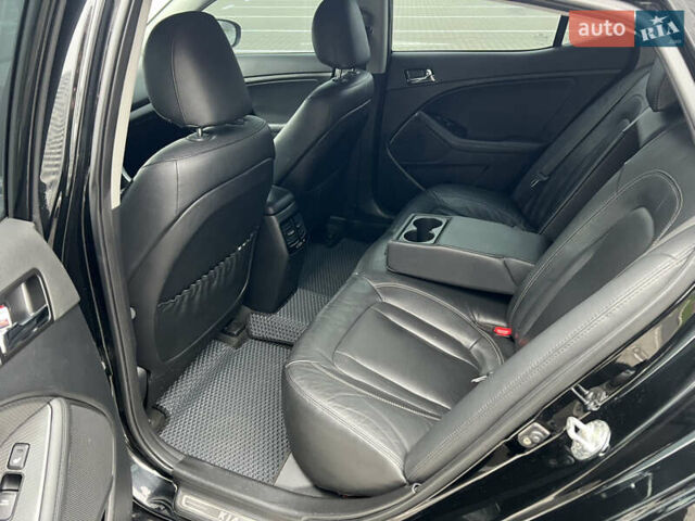 Черный Киа Оптима, объемом двигателя 2 л и пробегом 185 тыс. км за 10200 $, фото 15 на Automoto.ua