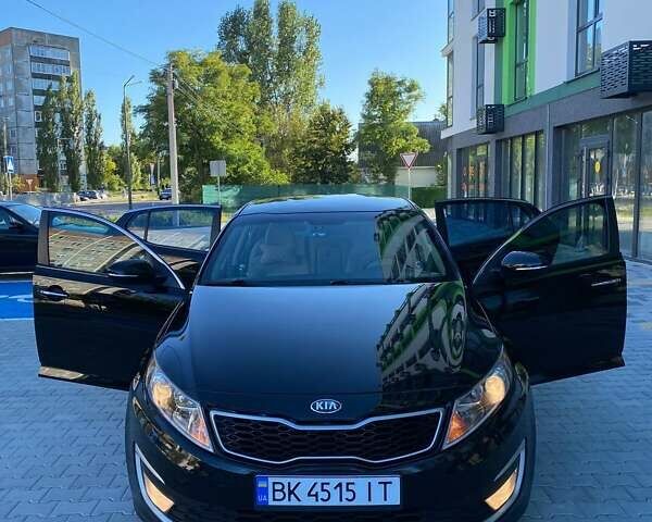 Черный Киа Оптима, объемом двигателя 2.36 л и пробегом 260 тыс. км за 7700 $, фото 4 на Automoto.ua