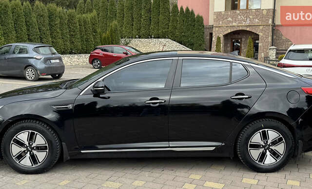 Черный Киа Оптима, объемом двигателя 2.36 л и пробегом 163 тыс. км за 8500 $, фото 5 на Automoto.ua