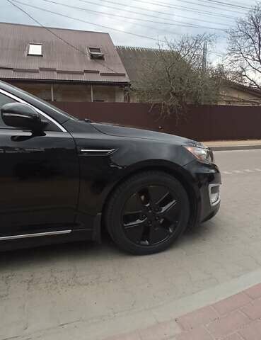 Черный Киа Оптима, объемом двигателя 2.36 л и пробегом 136 тыс. км за 10400 $, фото 16 на Automoto.ua