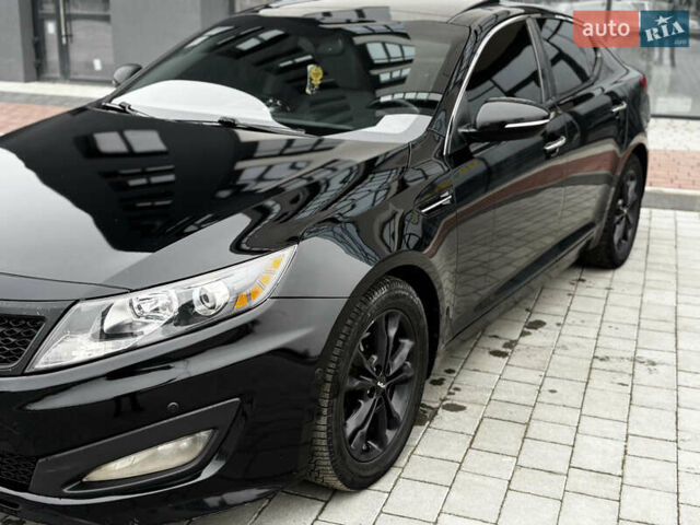 Чорний Кіа Оптіма, об'ємом двигуна 2.36 л та пробігом 206 тис. км за 6850 $, фото 11 на Automoto.ua