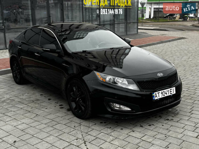 Чорний Кіа Оптіма, об'ємом двигуна 2.36 л та пробігом 206 тис. км за 6850 $, фото 8 на Automoto.ua