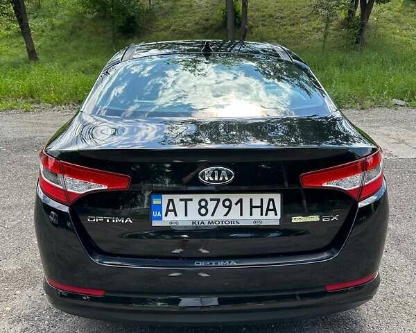 Черный Киа Оптима, объемом двигателя 2.36 л и пробегом 229 тыс. км за 10400 $, фото 18 на Automoto.ua