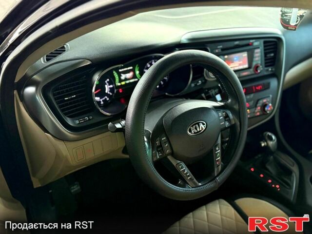 Черный Киа Оптима, объемом двигателя 2.4 л и пробегом 252 тыс. км за 10000 $, фото 6 на Automoto.ua