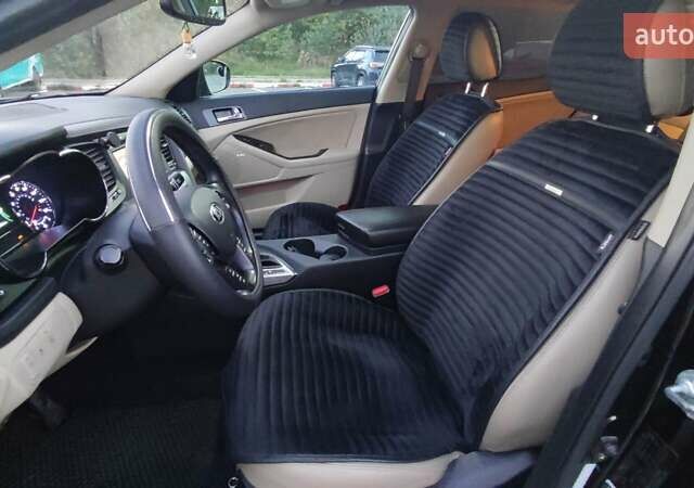 Черный Киа Оптима, объемом двигателя 2.36 л и пробегом 182 тыс. км за 11300 $, фото 11 на Automoto.ua