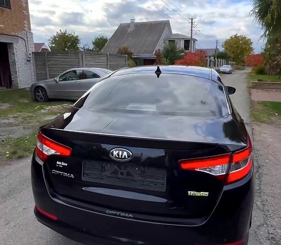 Черный Киа Оптима, объемом двигателя 2.4 л и пробегом 252 тыс. км за 10000 $, фото 5 на Automoto.ua