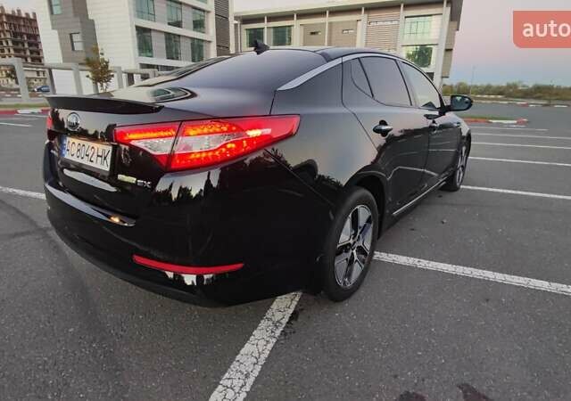 Черный Киа Оптима, объемом двигателя 2.36 л и пробегом 182 тыс. км за 11300 $, фото 1 на Automoto.ua