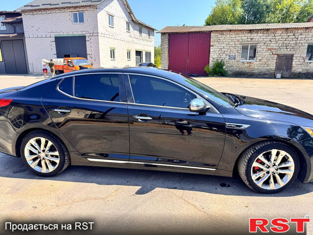 Черный Киа Оптима, объемом двигателя 2 л и пробегом 177 тыс. км за 10700 $, фото 12 на Automoto.ua