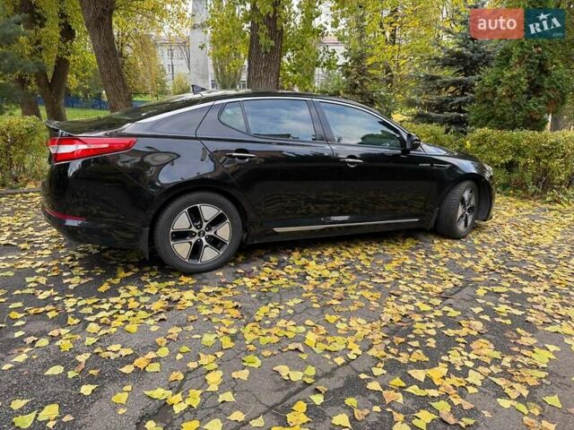 Черный Киа Оптима, объемом двигателя 2.4 л и пробегом 215 тыс. км за 9940 $, фото 5 на Automoto.ua