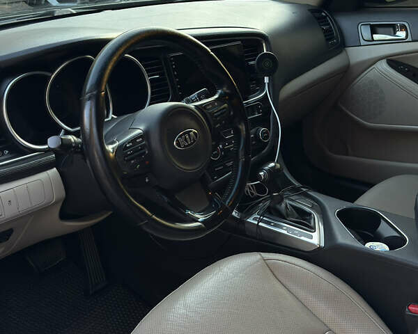 Чорний Кіа Оптіма, об'ємом двигуна 2.36 л та пробігом 175 тис. км за 8600 $, фото 7 на Automoto.ua