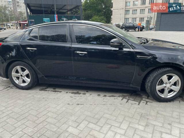 Черный Киа Оптима, объемом двигателя 2.36 л и пробегом 205 тыс. км за 8900 $, фото 5 на Automoto.ua
