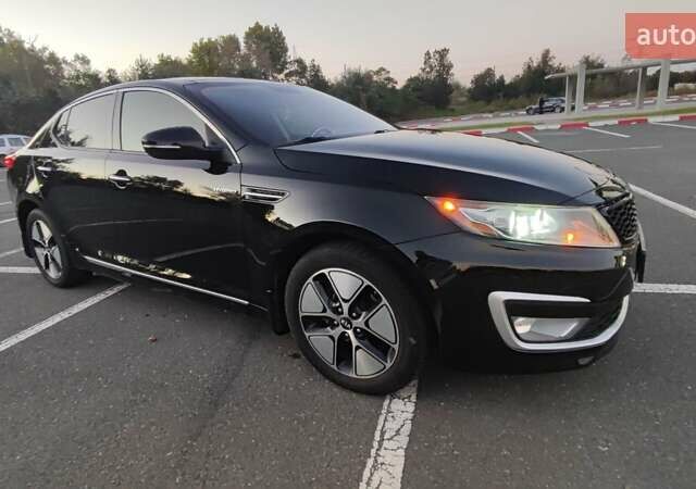 Черный Киа Оптима, объемом двигателя 2.36 л и пробегом 182 тыс. км за 11300 $, фото 5 на Automoto.ua