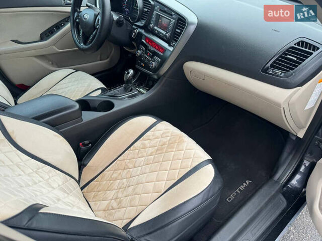 Черный Киа Оптима, объемом двигателя 2.36 л и пробегом 252 тыс. км за 11000 $, фото 12 на Automoto.ua