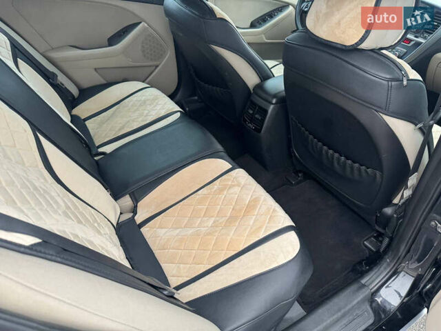 Черный Киа Оптима, объемом двигателя 2.36 л и пробегом 252 тыс. км за 11000 $, фото 11 на Automoto.ua