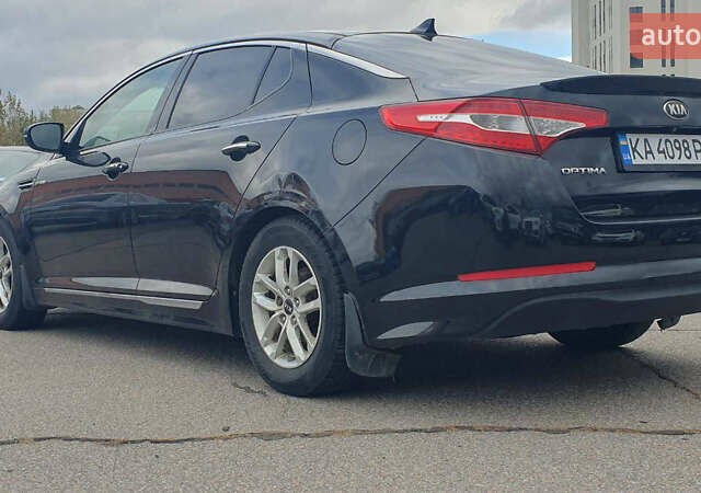 Черный Киа Оптима, объемом двигателя 2.36 л и пробегом 300 тыс. км за 7400 $, фото 3 на Automoto.ua