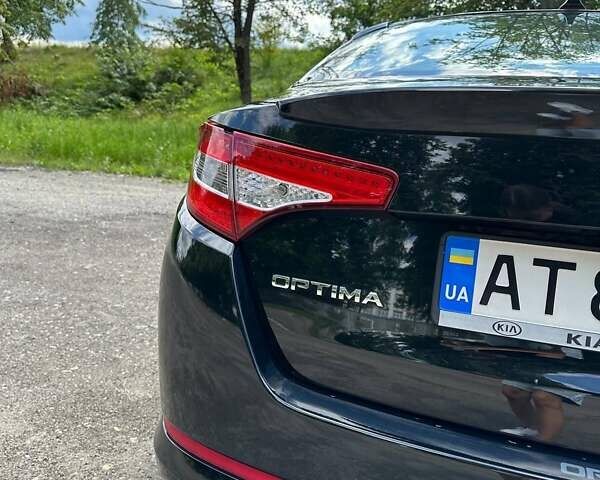 Черный Киа Оптима, объемом двигателя 2.36 л и пробегом 229 тыс. км за 10400 $, фото 16 на Automoto.ua