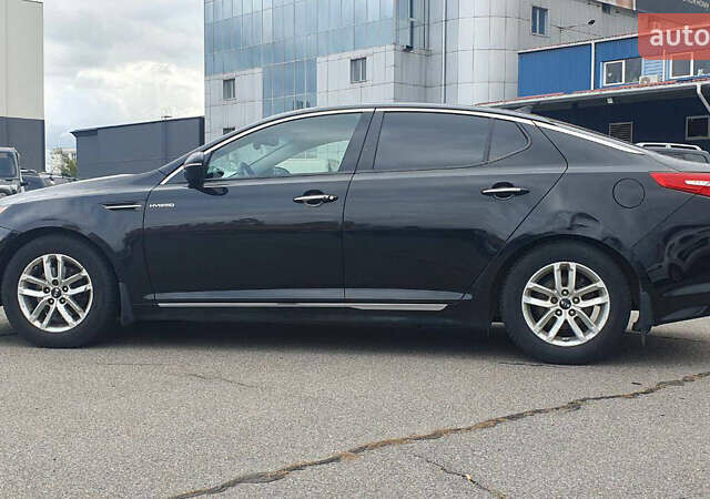 Черный Киа Оптима, объемом двигателя 2.36 л и пробегом 300 тыс. км за 7400 $, фото 4 на Automoto.ua