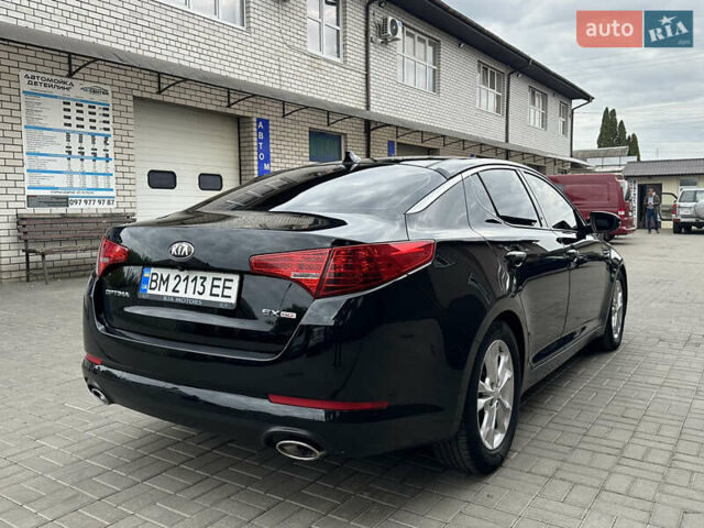 Черный Киа Оптима, объемом двигателя 2.36 л и пробегом 230 тыс. км за 8200 $, фото 4 на Automoto.ua