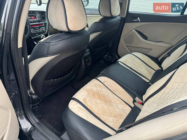 Черный Киа Оптима, объемом двигателя 2.36 л и пробегом 252 тыс. км за 11000 $, фото 9 на Automoto.ua