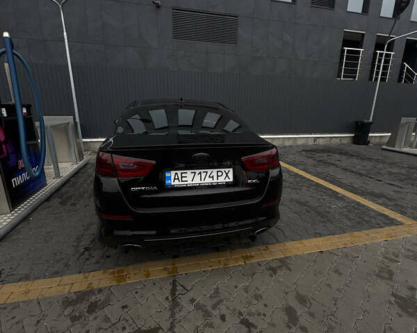 Чорний Кіа Оптіма, об'ємом двигуна 2 л та пробігом 174 тис. км за 12000 $, фото 5 на Automoto.ua