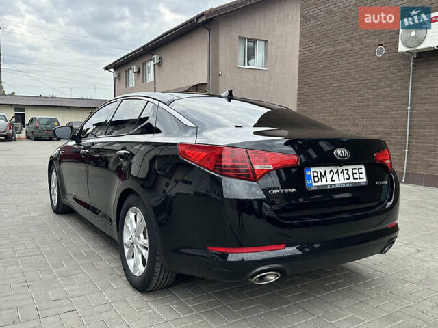 Черный Киа Оптима, объемом двигателя 2.36 л и пробегом 230 тыс. км за 8200 $, фото 2 на Automoto.ua