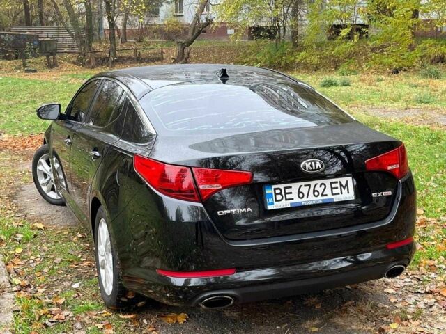 Черный Киа Оптима, объемом двигателя 2.4 л и пробегом 240 тыс. км за 9500 $, фото 2 на Automoto.ua